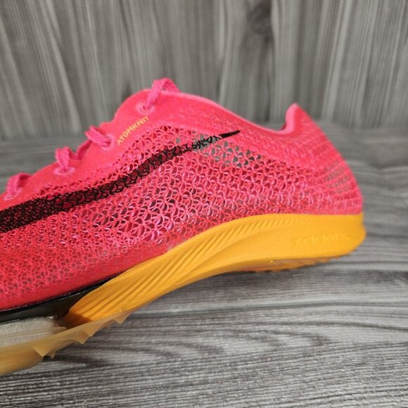 pink nike running spikes